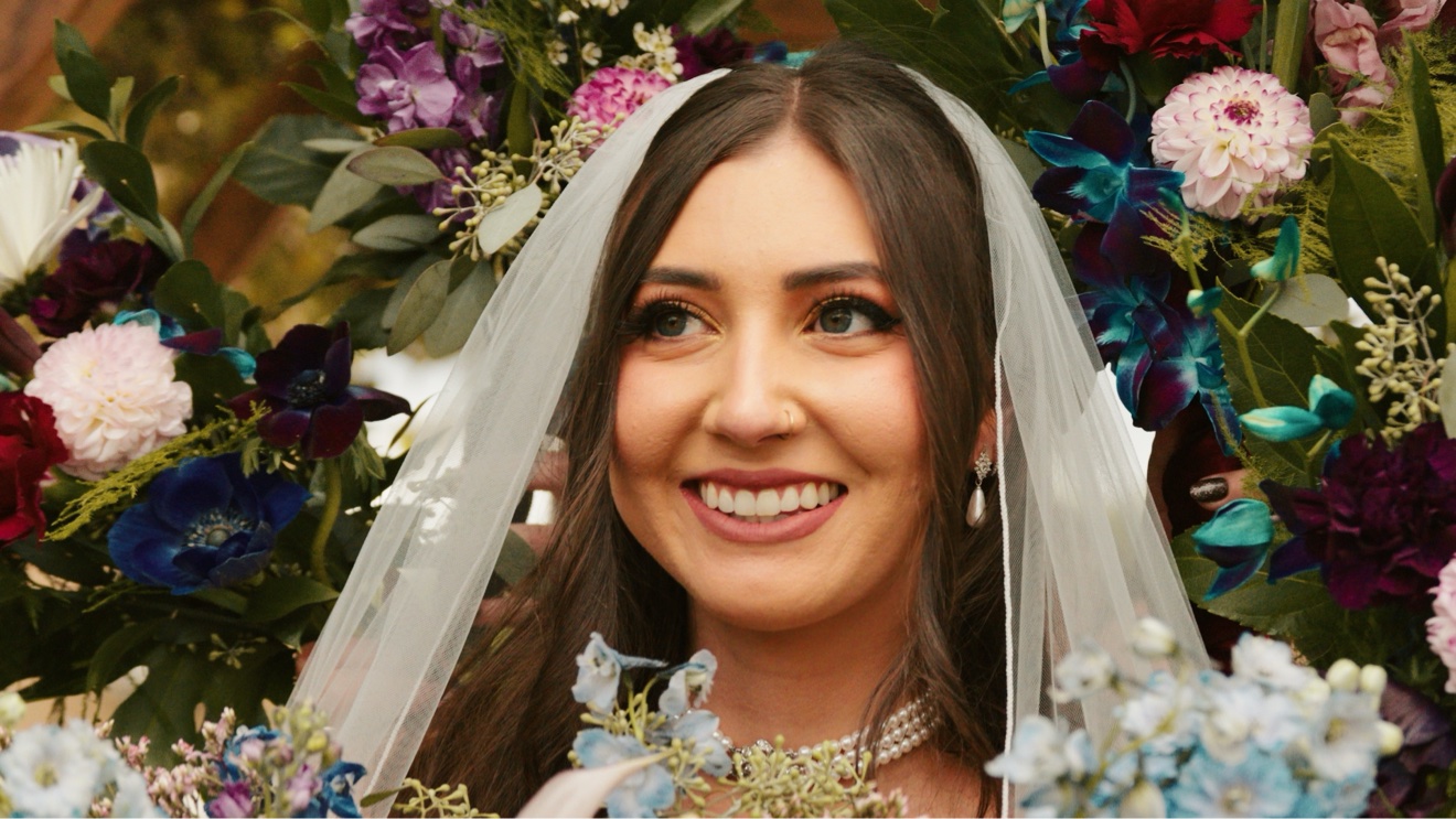 Bride surrounded by flowers